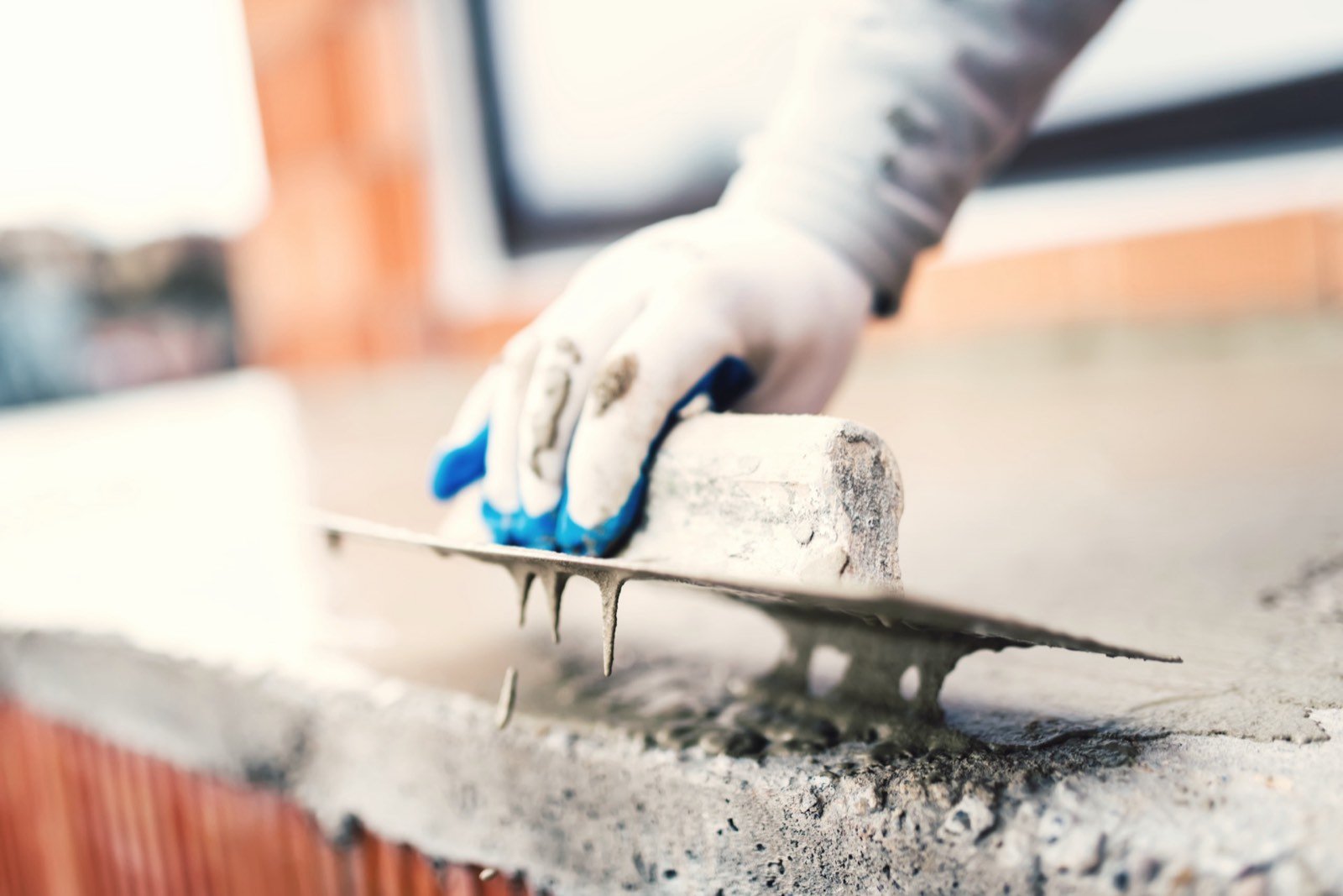 Concrete construction and high-range cement dispersion