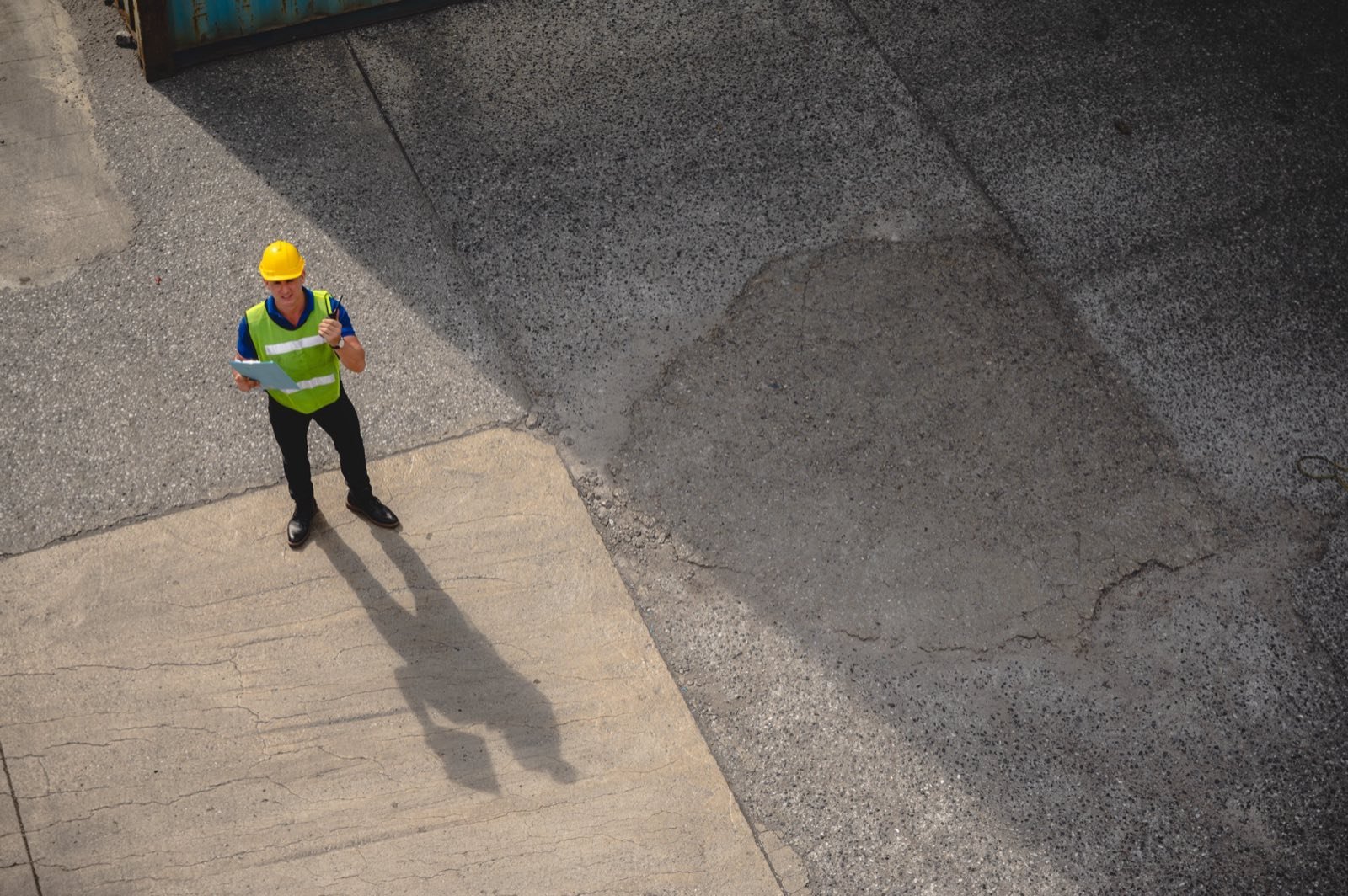 Quality assurance specialist inspecting steel fiber batch documentation