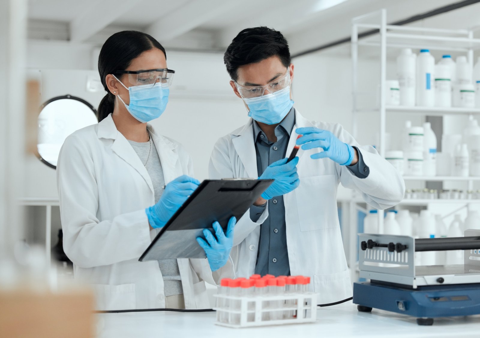 Laboratory specialist preparing a controlled material test